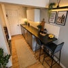 Photo 2: Includes Kitchenette & Breakfast bar (includes appliances)