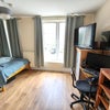 Photo 2: Bedroom with double bed, Desk and cupbards