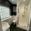 Photo 9: Downstairs Shared Bathroom