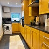Photo 5: Kitchen & laundry 🧺