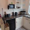 Photo 8: Kitchen with fridge, microwave, airfryer, kettle, toaster, sink