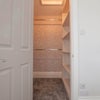 Photo 3: Walk-in wardrobe with shelving & hanging space
