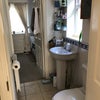 Photo 4: Shower (not in view) + toilet