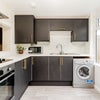 Photo 7: Kitchen is fully equipped, including a washing machine and tumble dryer!