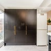 Photo 8: More than enough storage in the kitchen with these cupboards, as well as 2 fridge/freezers!