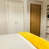 Photo 9: Room 6 - showing door to room. 