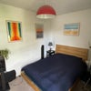 Photo 1: Upstairs back bedroom big enough for king sized bed and beautiful garden views