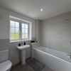 Photo 2:     Private bathroom with full-size bath & shower