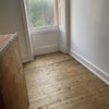 Photo 8: There is now carpet but just to see the window. 