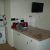 Photo 2: Kitchen area