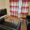 Photo 1: Open kitchen and sitting room 