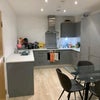 Photo 6: Downstairs kitchen