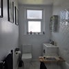 Photo 3: Bathroom with bath and shower 