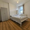 Photo 3: Room 2. Wooden floor