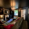 Photo 2: Lounge with open fire, cosy in winter.