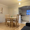 Photo 1: Dining room and Kitchen