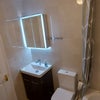 Photo 8: Bathroom cabinet with light. 