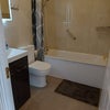 Photo 7: First floor bathroom. 
