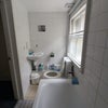 Photo 3: The Shared Bathroom
