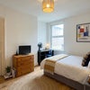 Photo 5: Room 2 (1st Floor)