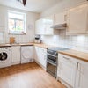 Photo 2: Bright, clean and spacious Kitchen