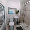 Photo 2: Shared washroom b/w two person