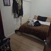 Photo 3: Bedroom includes bed and wardrobe (not pictured)