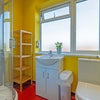 Photo 5: Two modern bathrooms