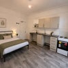 Photo 2: Room 2 (Semi-Studio)