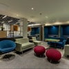 Photo 8: common room with ping pong, tv, and football table