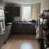 Photo 5: Washing machine and dishwasher hidden behind cupboard doors.