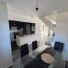 Photo 6: Dining Area Overlooking Kitchen Area 