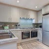 Photo 4: kitchen area