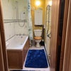 Photo 4: Bathroom shared by lodgers - Gas boiler controls heat and hot water on Lodger Floor