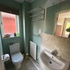 Photo 4: En suite showing toilet and basin