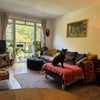 Photo 2: Living Room & Balcony - Gus dog, TV with Netflix, Prime, Now, Mubi, Channel 4 etc. 