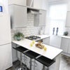 Photo 1: Brand new kitchen, lovely breakfast bar perfect for socialising whilst cooking