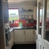 Photo 3: Kitchen with oven, dishwasher and washer/dryer