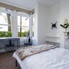 Photo 1: Room 1 - view of bay window & desk