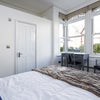 Photo 2: Room 1 - view of window & ensuite door