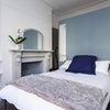 Photo 3: Room 1 - view to bed & bespoke cupboard