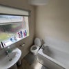 Photo 3: bathroom shared with one boy