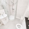 Photo 4: Shared Bathroom (between 2)