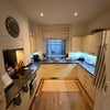 Photo 7: Fully Equipped Kitchen looking over back private terrace 