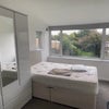 Photo 1: Bedroom: Bed, Window & Wardrobe