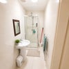 Photo 2: Bathroom with all sanitary ware / Shower enclouser