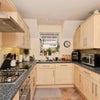 Photo 6: The kitchen