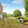 Photo 4: The communal garden (and our furniture)
