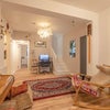 Photo 7: Shared reception/living area