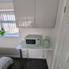 Photo 18: Microwave and kettle